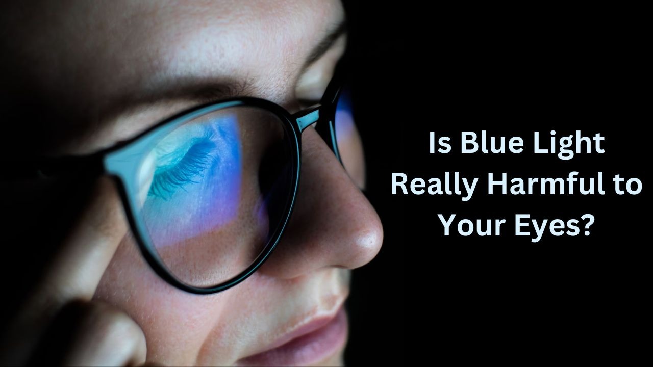 Person using a laptop and phone at night showing blue light exposure to the eyes